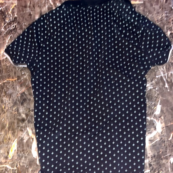 It’s a medium but. Fits like small guess polo - Picture 4 of 4